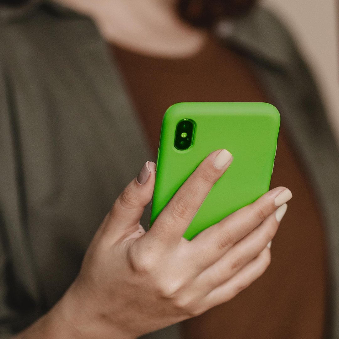 A woman using her mobile phone.