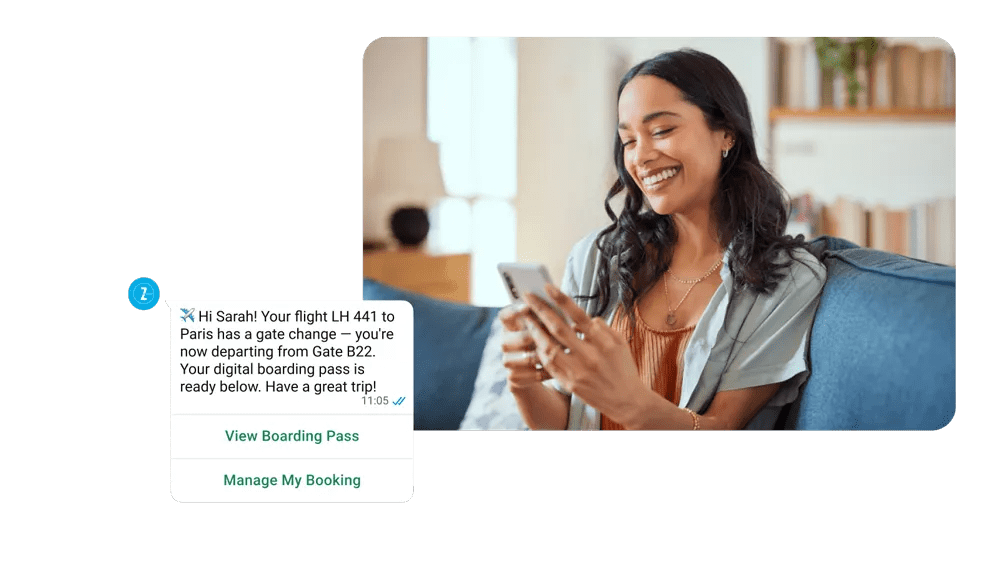 A woman receiving a message update about her upcoming flight