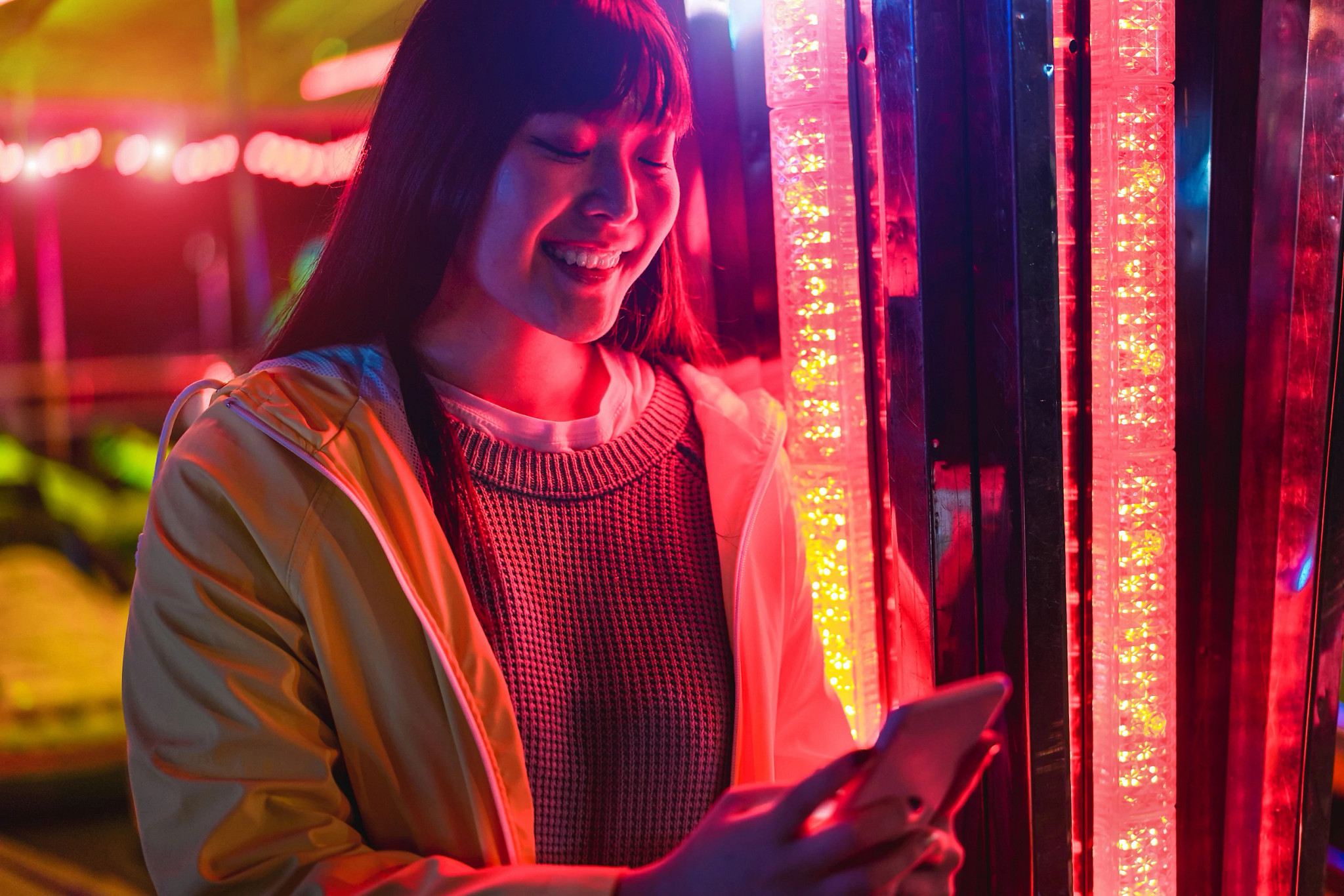 A woman using her mobile phone.