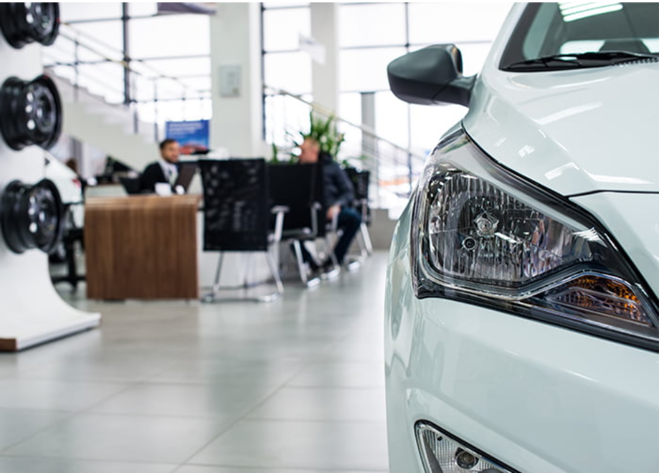 The interior of a DCH Motors showroom.
