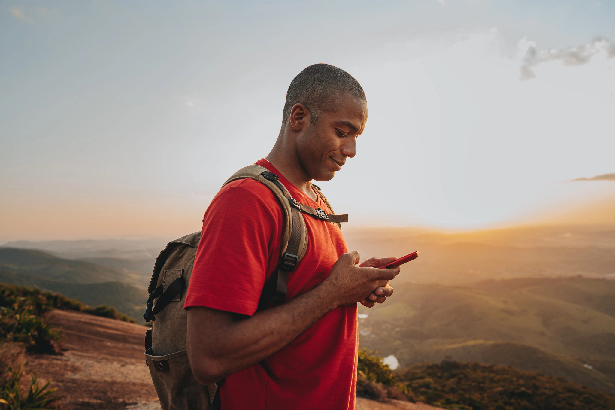 A man checks his phone.