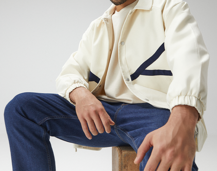 A male model wearing clothes from Styli.