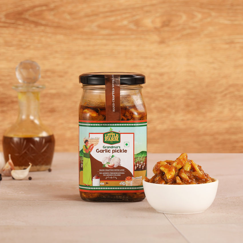 A jar of garlic pickles on a table
