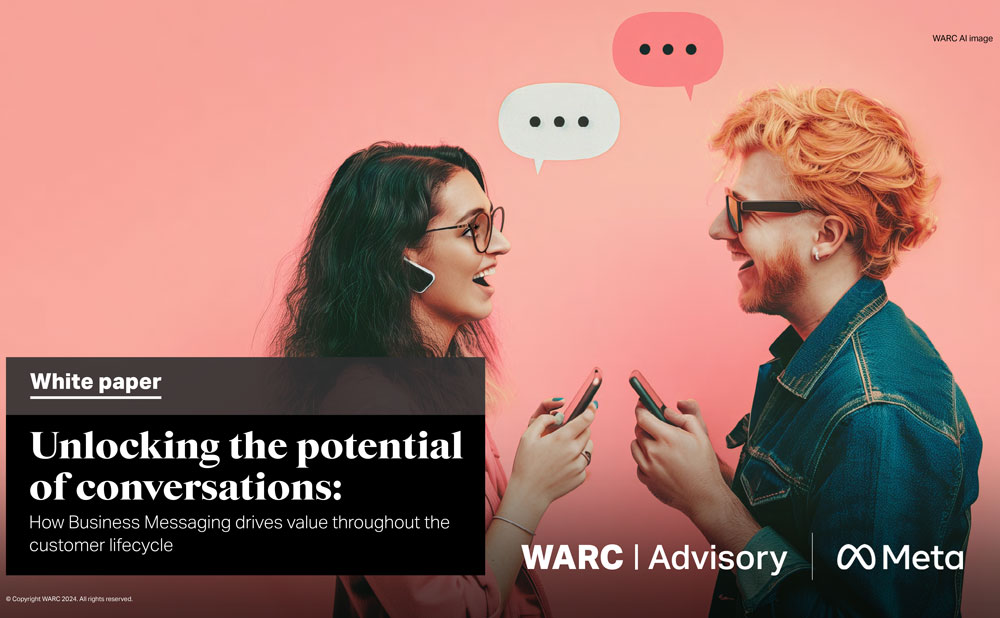 A man and a woman talking to each other while holding their phones