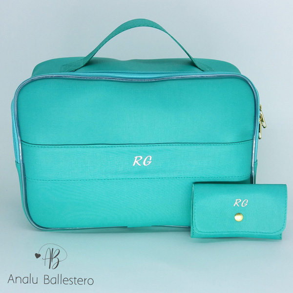 A teal bag and purse made by Analu Ballestero