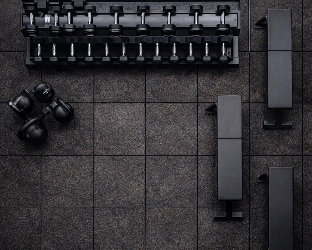 Top view of gym floor with weight equipment