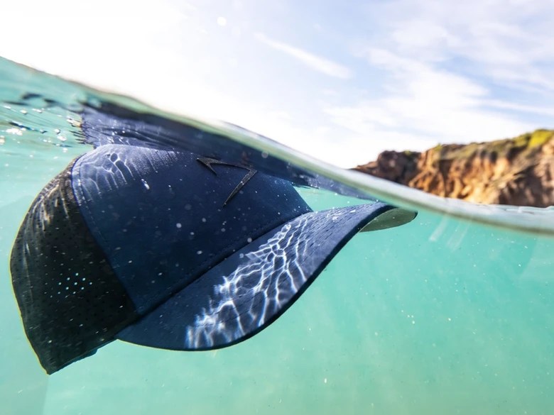 An apol hat floating in the water