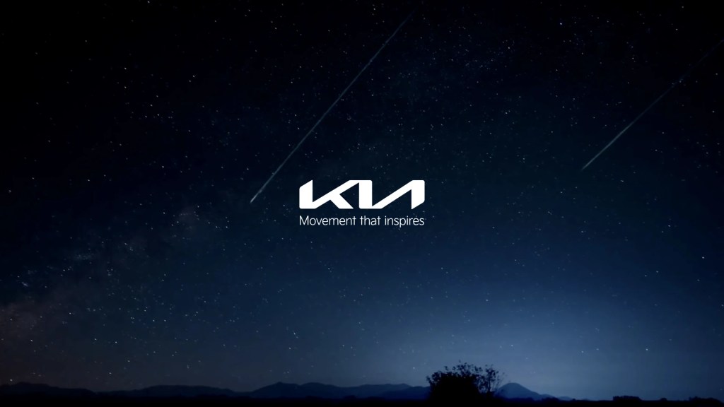 Kia logo on a sky background