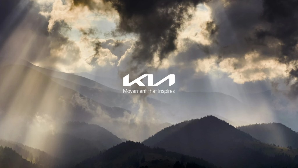 Kia logo on a sky background